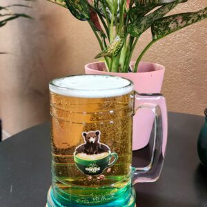 a mug full of beer on the table