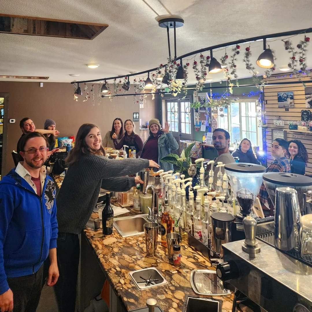 people at the counter in the Bear Cub Coffee & Pub